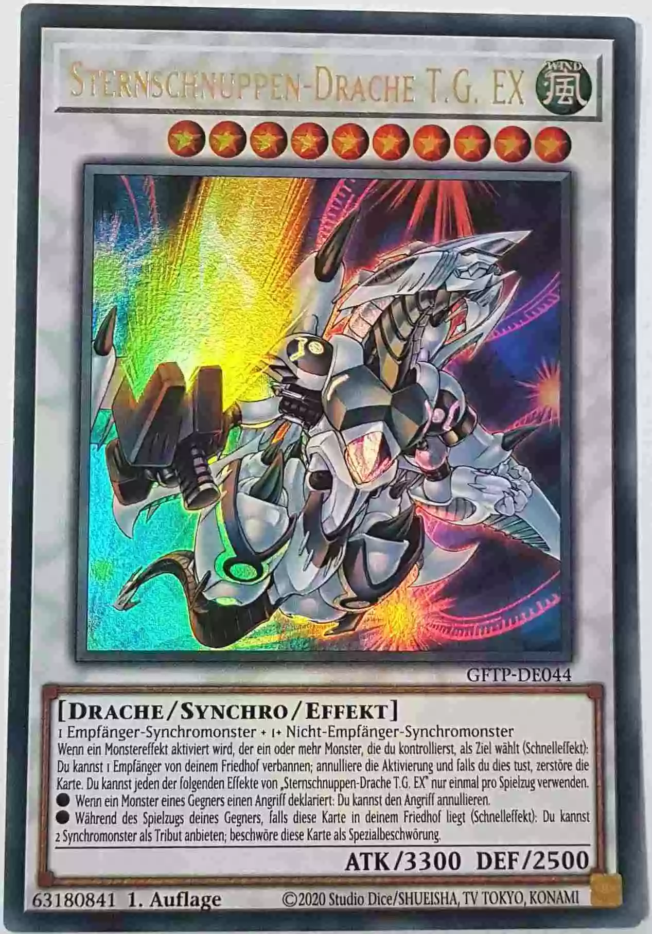 Sternschnuppen-Drache T.G. EX GFTP-DE044 ist in Ultra Rare Yu-Gi-Oh Karte aus Ghost From The Past 1.Auflage