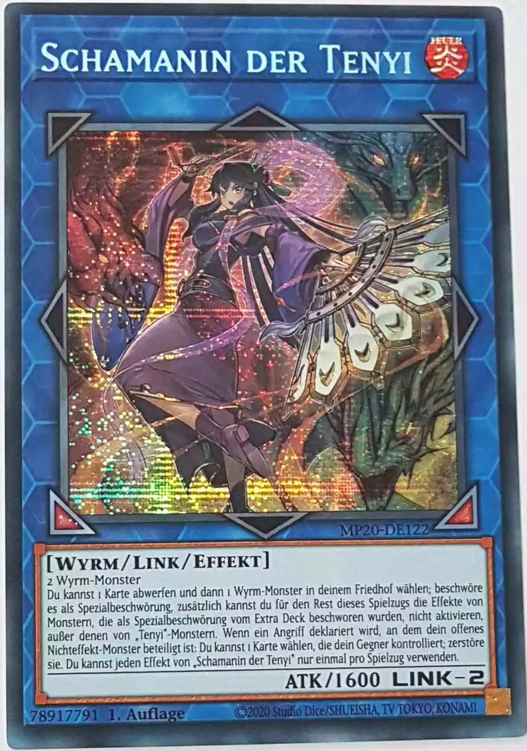 Schamanin der Tenyi MP20-DE122 ist in Prismatic Secret Rare Yu-Gi-Oh Karte aus 2020 Tin of Lost Memories 1.Auflage