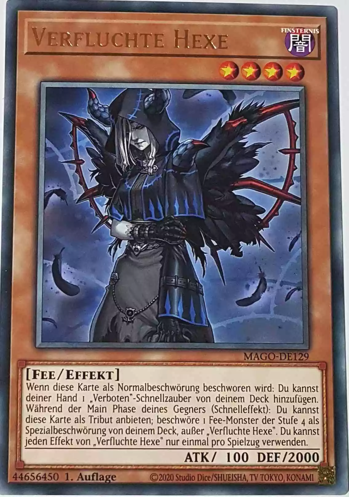 Verfluchte Hexe MAGO-DE129 ist in Gold Rare Yu-Gi-Oh Karte aus Maximum Gold 1. Auflage