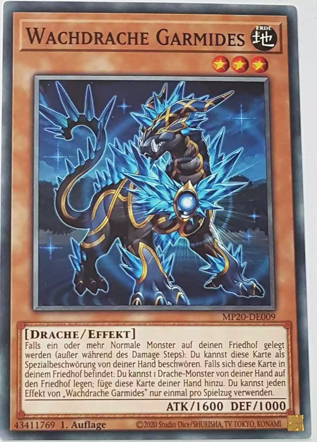 Wachdrache Garmides MP20-DE009 ist in Common Yu-Gi-Oh Karte aus 2020 Tin of Lost Memories 1.Auflage