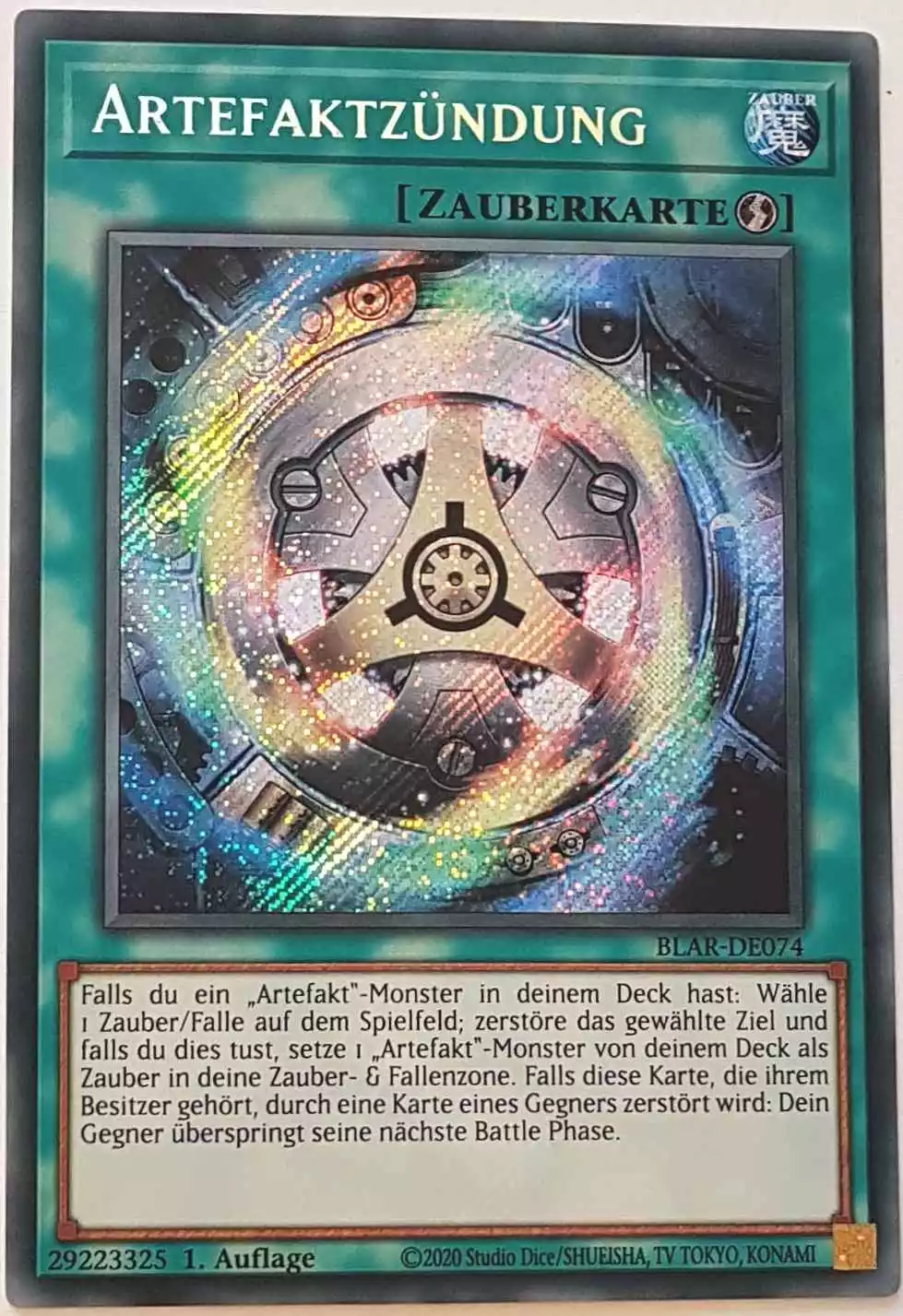 Artefaktzündung BLAR-DE074 ist in Secret Rare Yu-Gi-Oh Karte aus Battles of Legend: Armageddon 1.Auflage