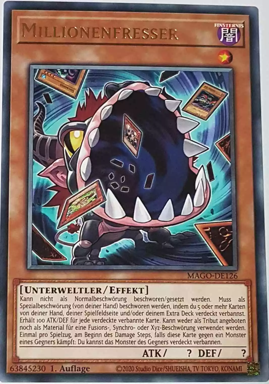 Millionenfresser MAGO-DE126 ist in Gold Rare Yu-Gi-Oh Karte aus Maximum Gold 1. Auflage