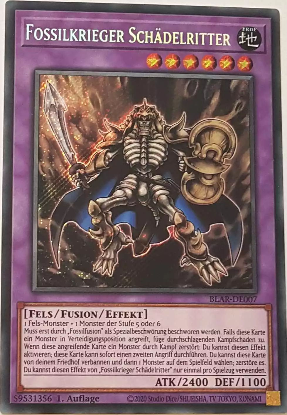 Fossilkrieger Schädelritter BLAR-DE007 ist in Secret Rare Yu-Gi-Oh Karte aus Battles of Legend: Armageddon 1.Auflage