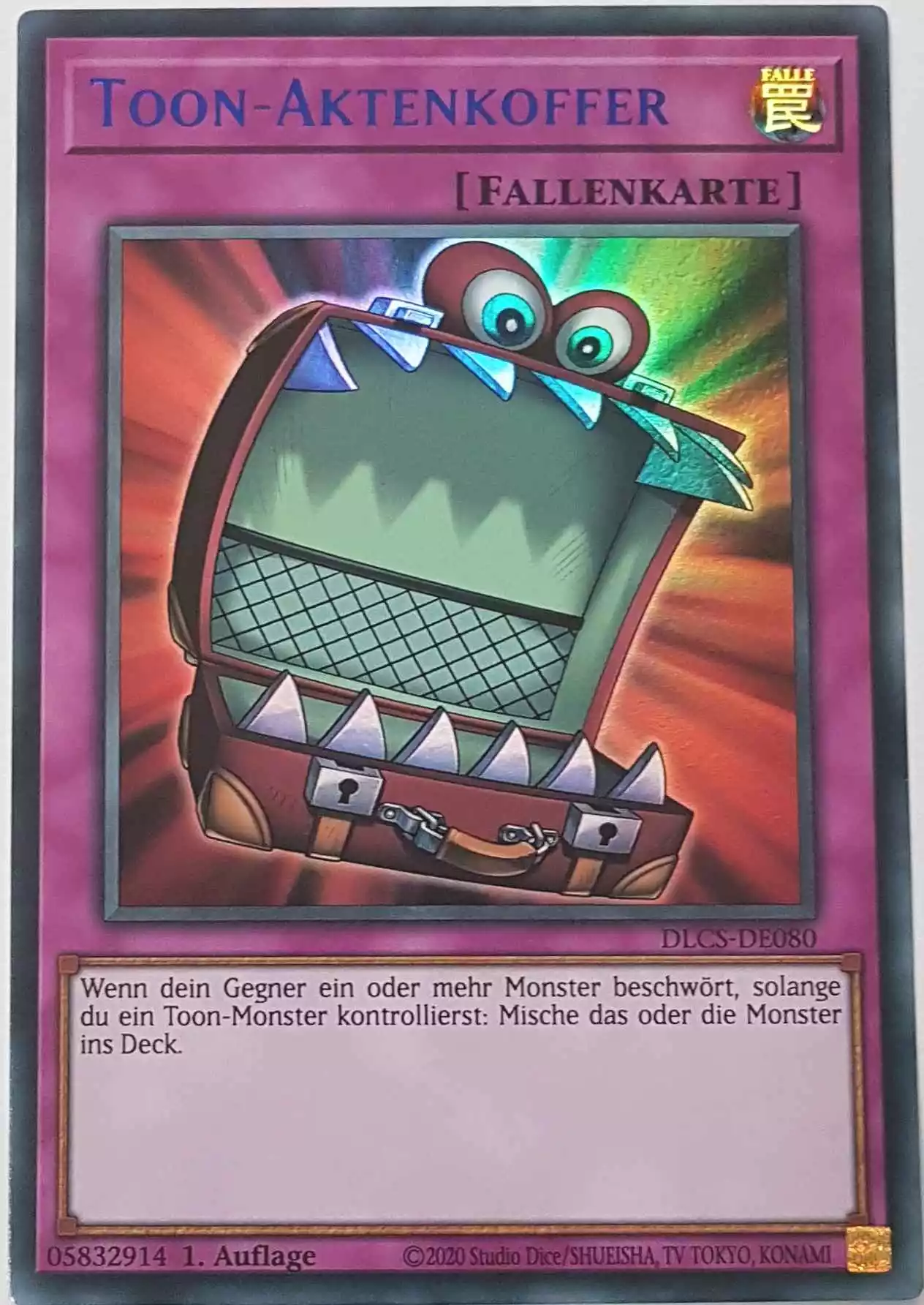 dlcs-de080-b-toon-aktenkoffer-blau-colorful-ultra-rare Toon-Aktenkoffer (blau) DLCS-DE080-B ist in Colorful Ultra Rare Yu-Gi-Oh Karte aus Dragons of Legend The Complete Series 1.Auflage