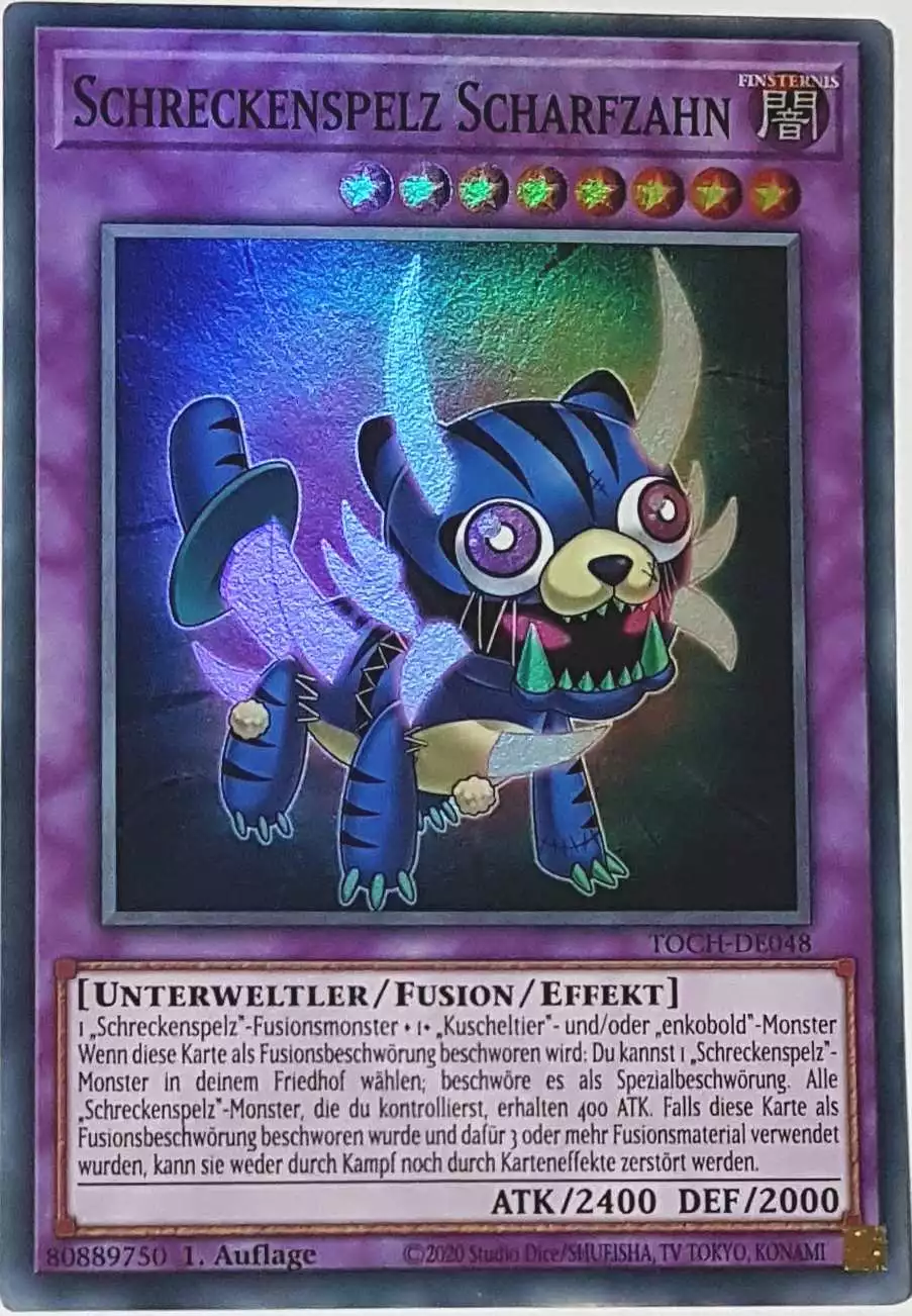 Schreckenspelz Scharfzahn TOCH-DE048 ist in Super Rare Yu-Gi-Oh Karte aus Toon Chaos 1.Auflage