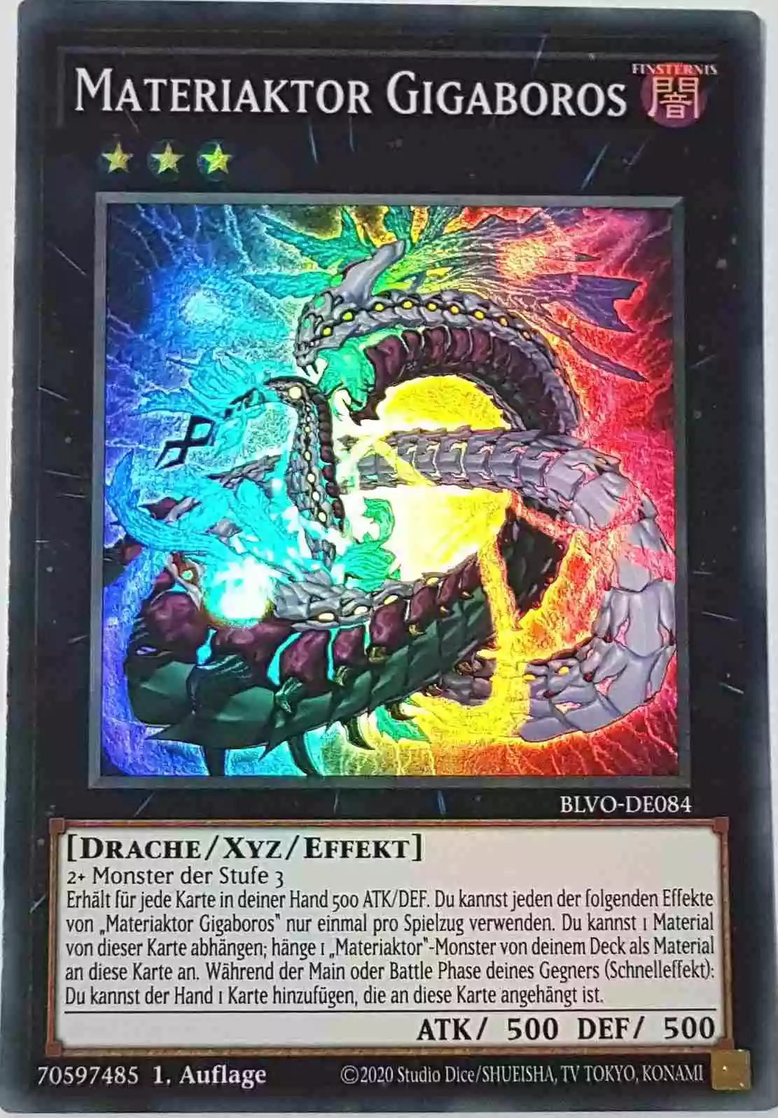 Materiaktor Gigaboros BLVO-DE084 ist in Super Rare Yu-Gi-Oh Karte aus Blazing Vortex 1.Auflage