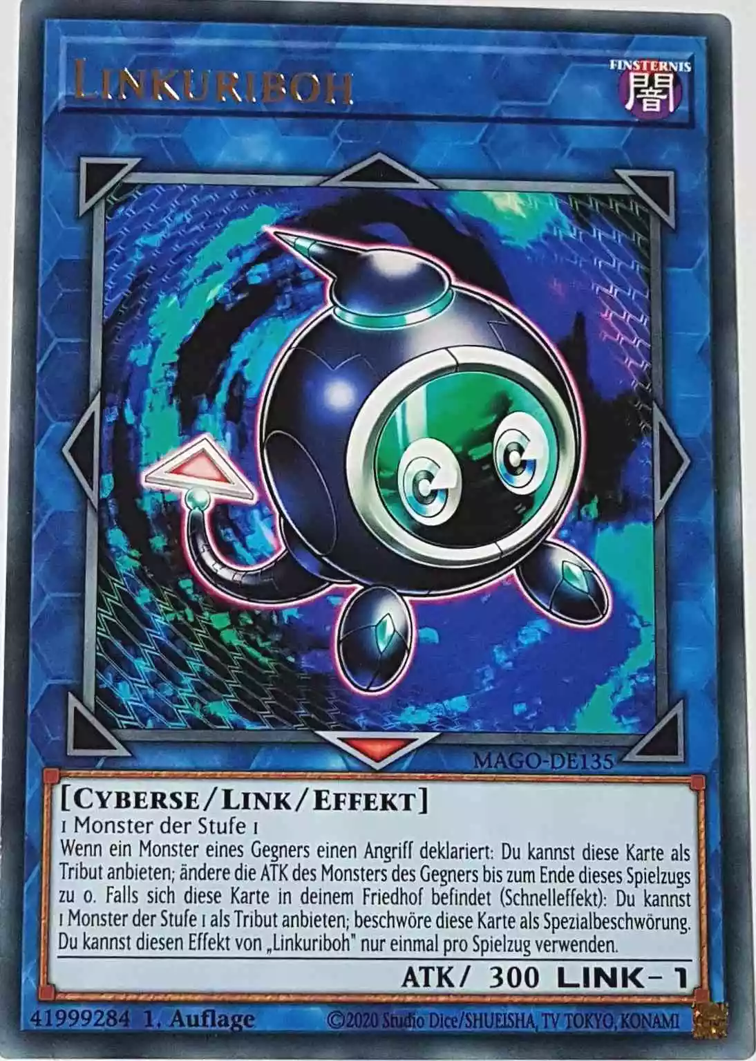 Linkuriboh MAGO-DE135 ist in Gold Rare Yu-Gi-Oh Karte aus Maximum Gold 1. Auflage