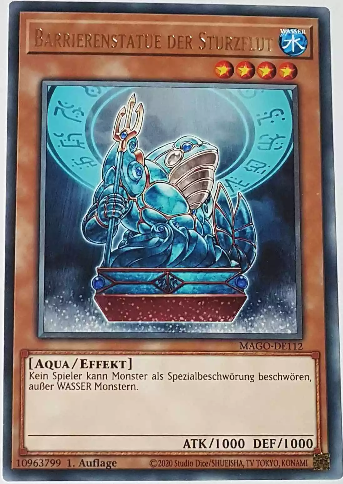 Barrierenstatue der Sturzflut MAGO-DE112 ist in Gold Rare Yu-Gi-Oh Karte aus Maximum Gold 1. Auflage