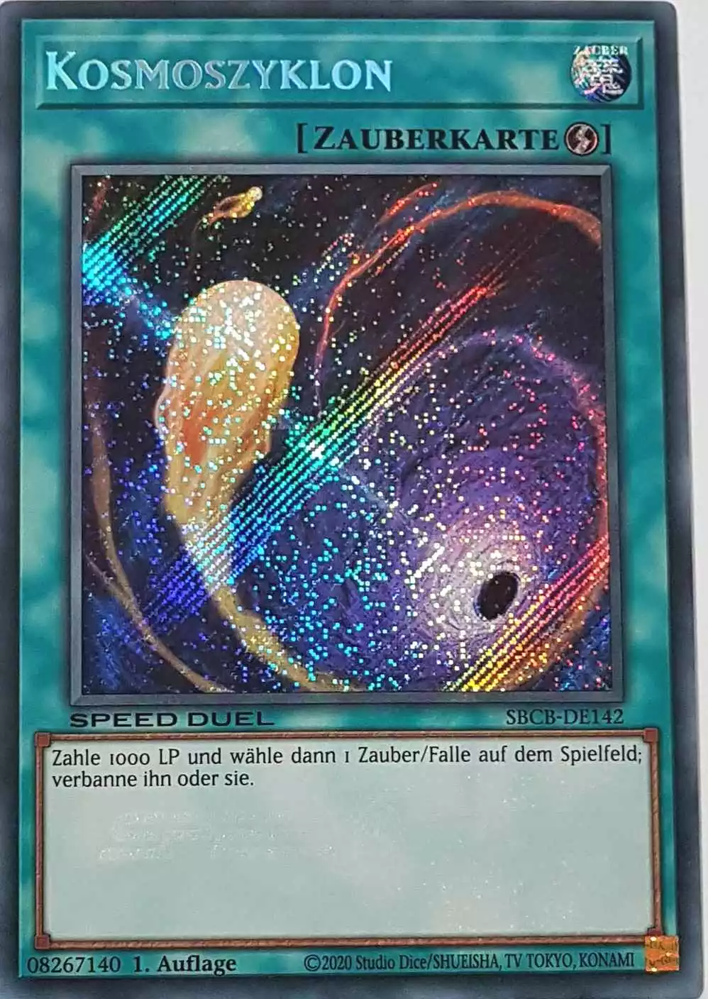 Kosmoszyklon SBCB-DE142-1 ist in Secret Rare Yu-Gi-Oh Karte aus Speed Duel Battle City Box 1. Auflage