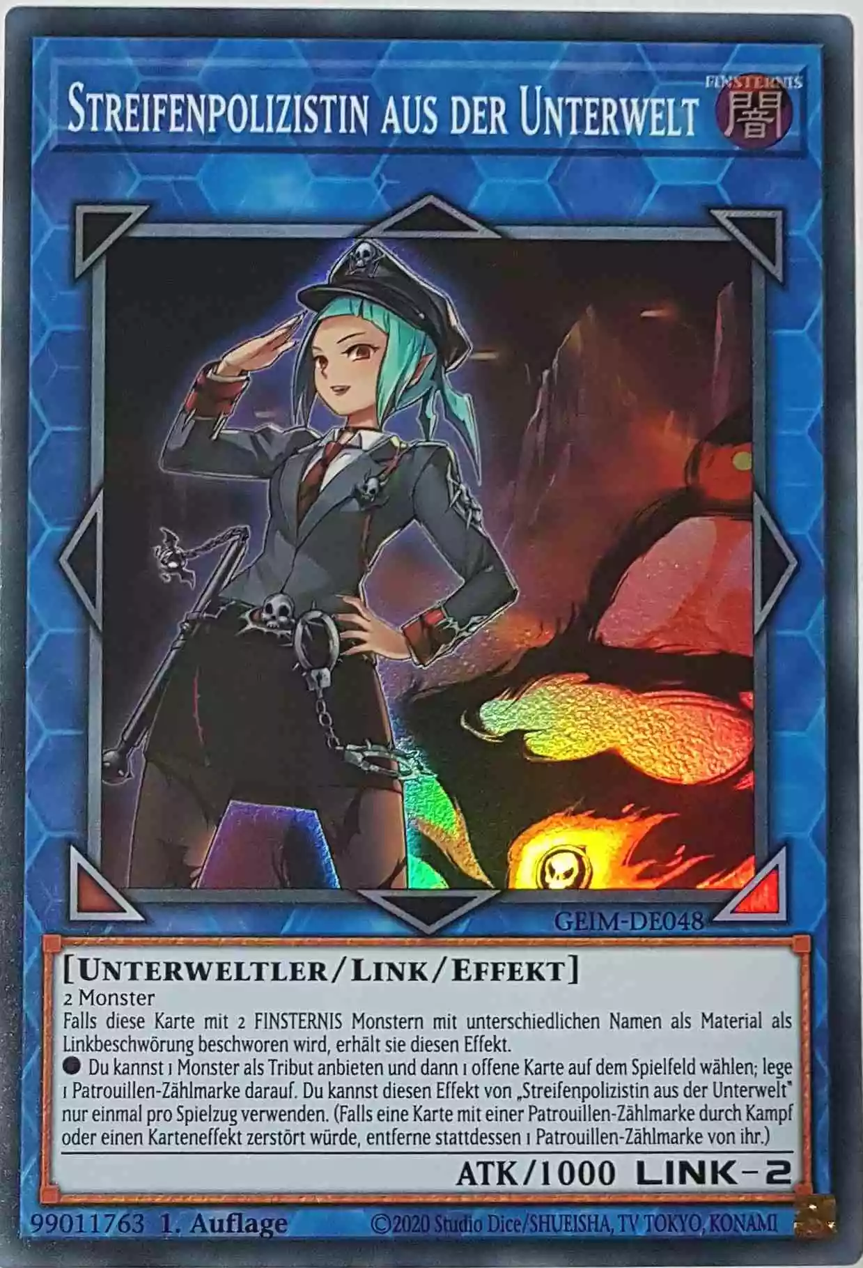 Streifenpolizistin aus der Unterwelt GEIM-DE048 ist in Super Rare Yu-Gi-Oh Karte aus Genesis Impact 1. Auflage