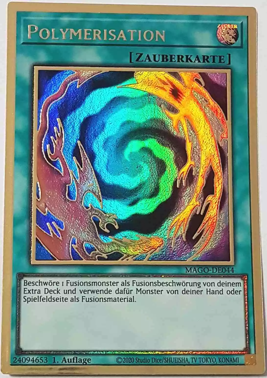 Polymerisation MAGO-DE044 ist in Premium Gold Rare Yu-Gi-Oh Karte aus Maximum Gold 1. Auflage