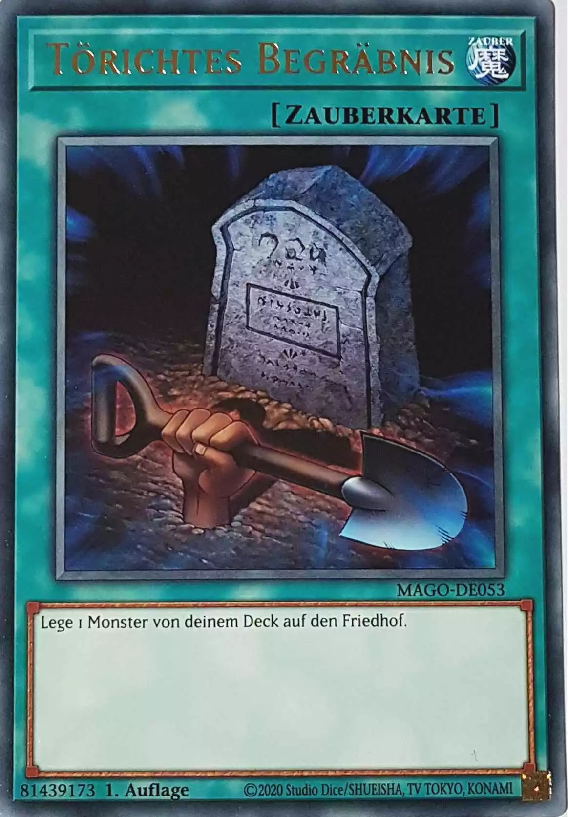 Törichtes Begräbnis MAGO-DE053 ist in Gold Rare Yu-Gi-Oh Karte aus Maximum Gold 1. Auflage