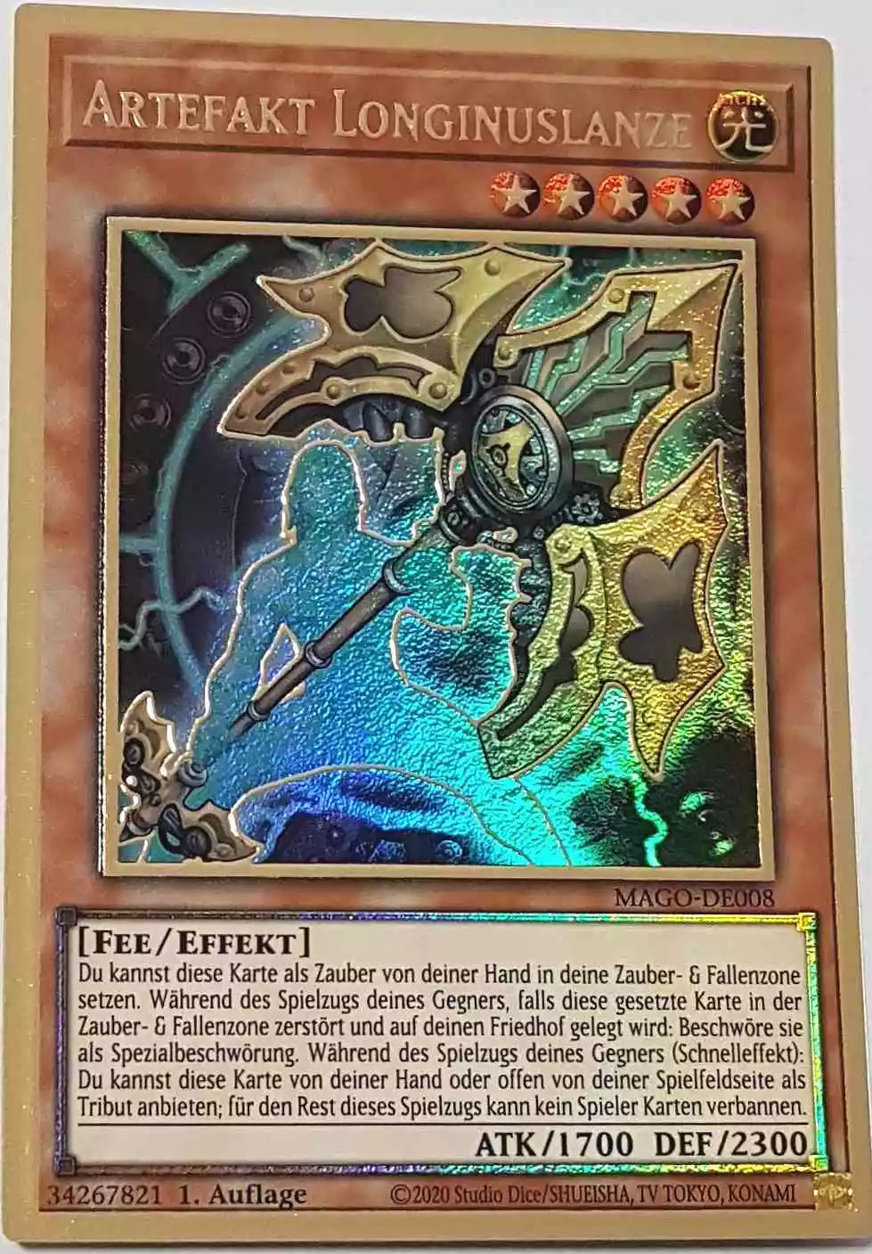 Artefakt Longinuslanze MAGO-DE008 ist in Premium Gold Rare Yu-Gi-Oh Karte aus Maximum Gold 1. Auflage