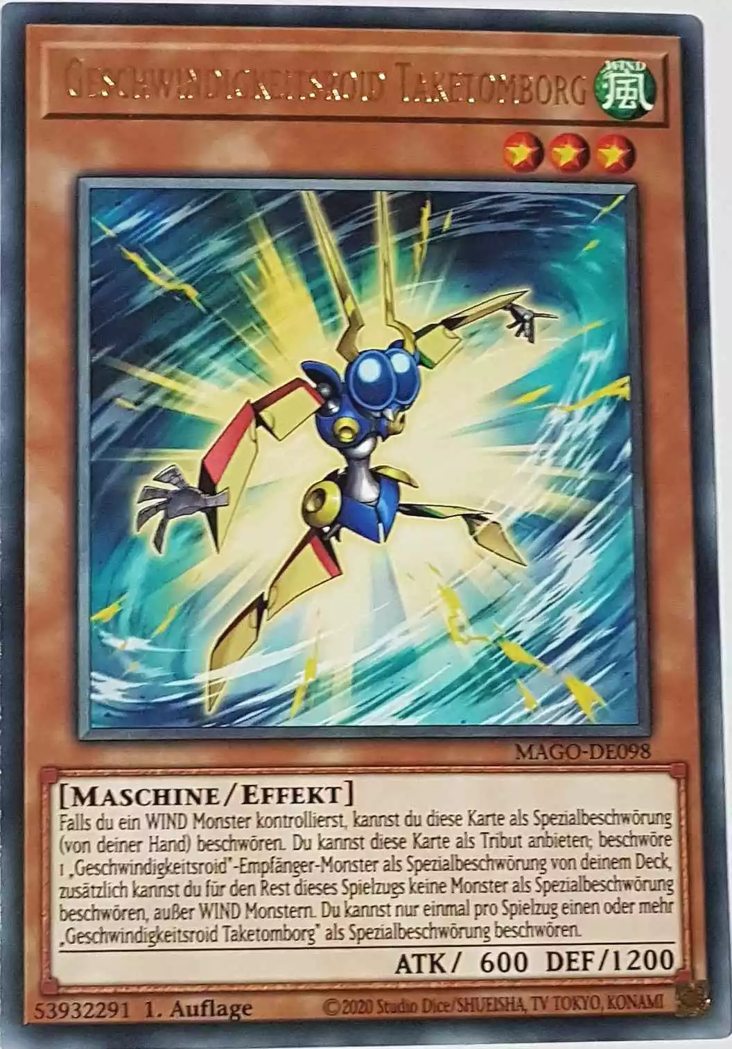 Geschwindigkeitsroid Taketomborg MAGO-DE098 ist in Gold Rare Yu-Gi-Oh Karte aus Maximum Gold 1. Auflage