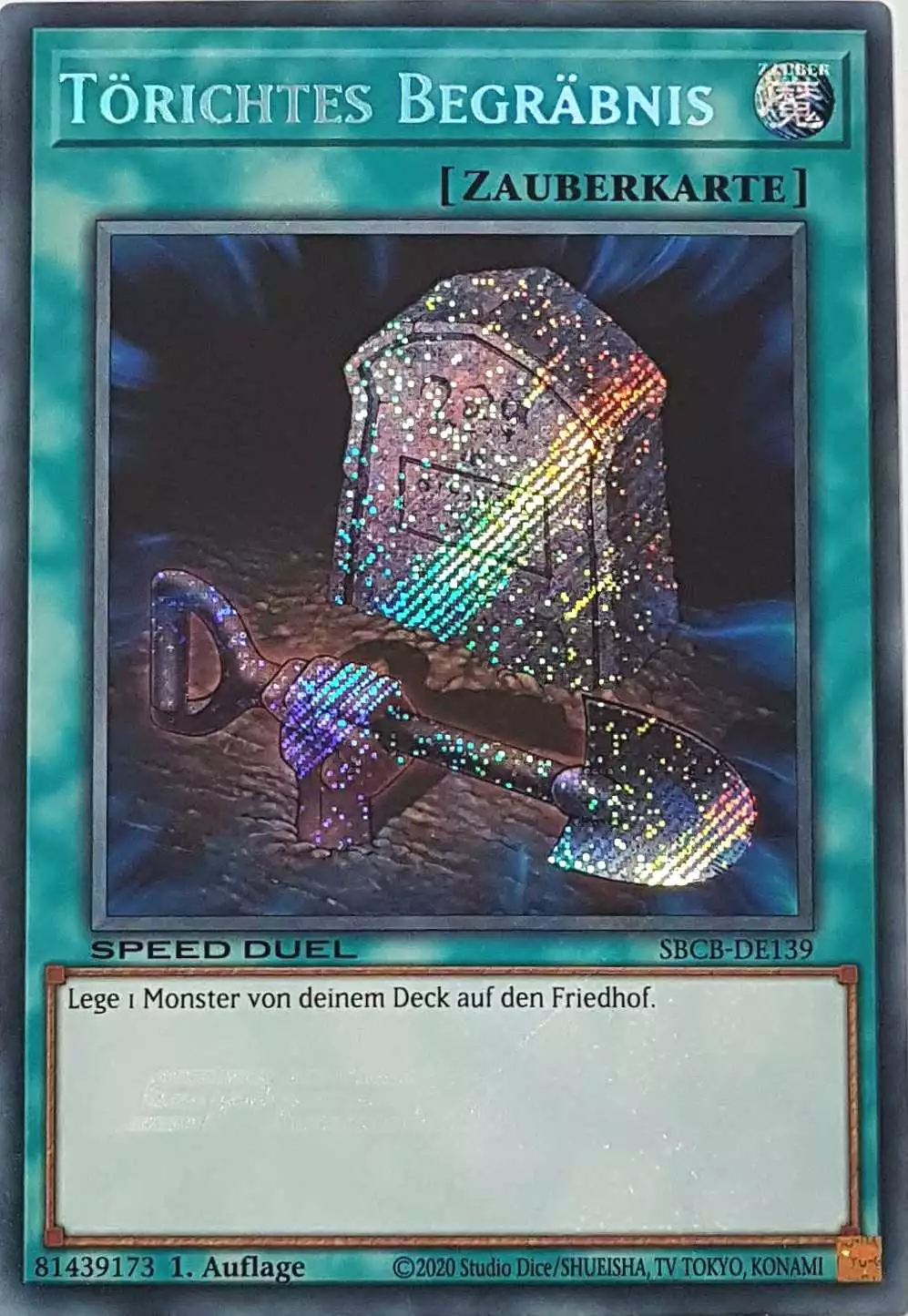 Törichtes Begräbnis SBCB-DE139-1 ist in Secret Rare Yu-Gi-Oh Karte aus Speed Duel Battle City Box 1. Auflage