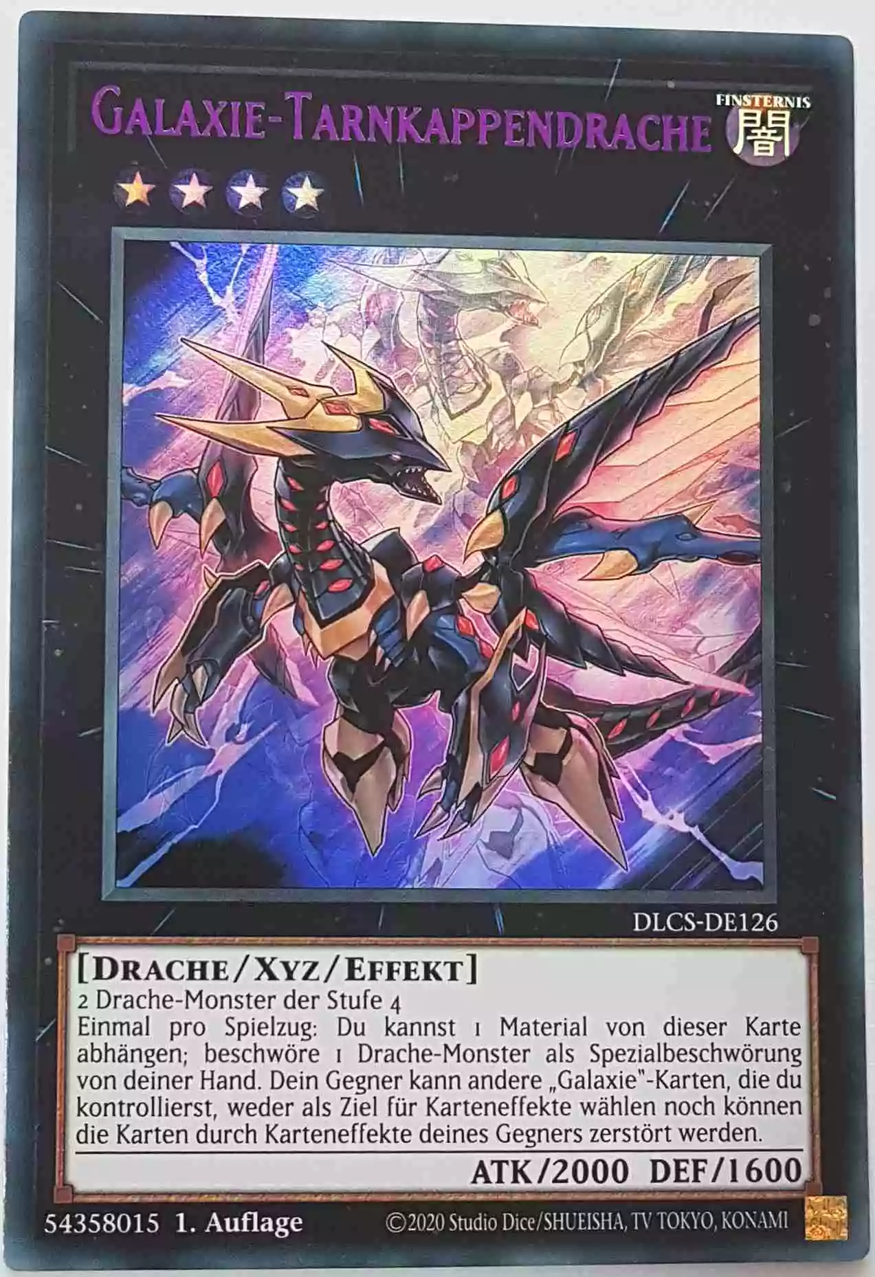 dlcs-de126-l-galaxie-tarnkappendrache-lila-colorful-ultra-rare Galaxie-Tarnkappendrache (lila) DLCS-DE126-L ist in Colorful Ultra Rare Yu-Gi-Oh Karte aus Dragons of Legend The Complete Series 1.Auflage